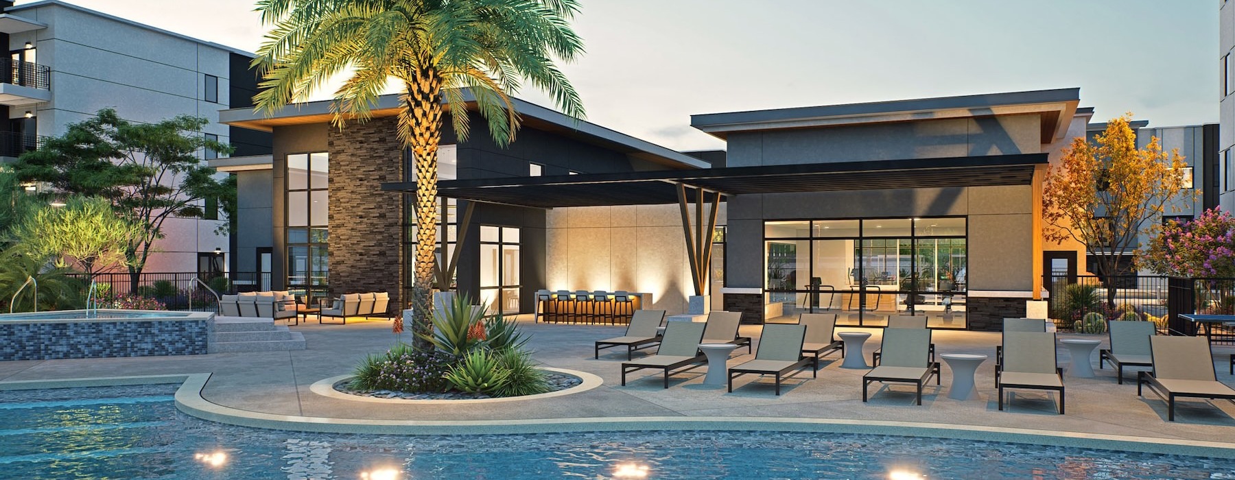 a swimming pool with chairs and a palm tree